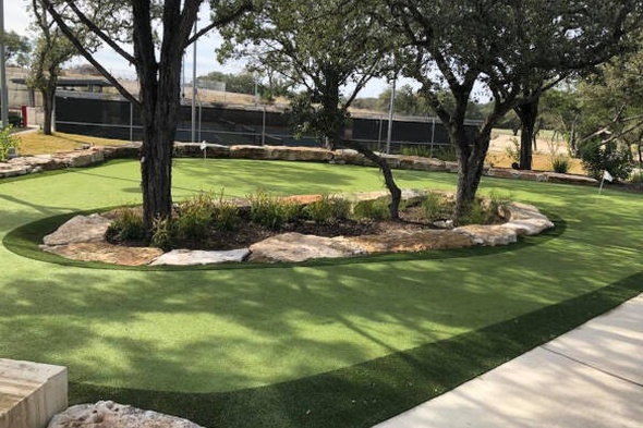 Fresno residential backyard putting green grass